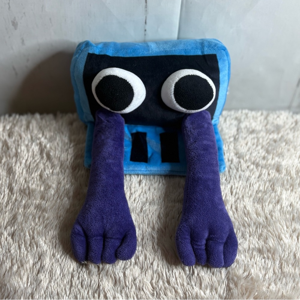 Blue and Purple Stuffed Animal Toy